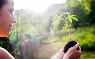 Woman holding up a hemp startling 