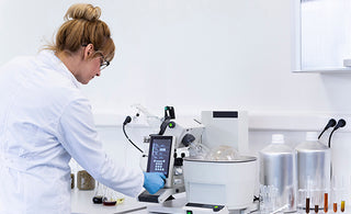 Scientist in a Lab Testing Product