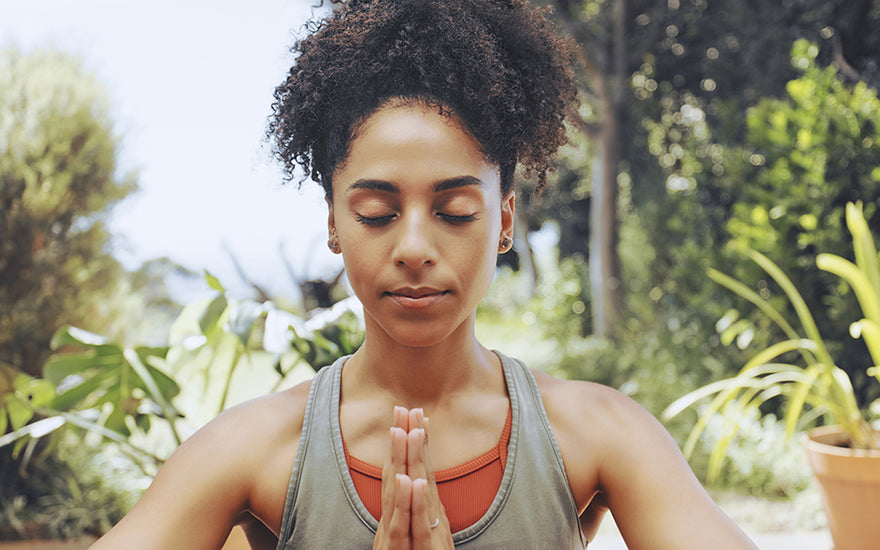 Woman Meditating Outside