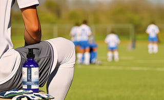 lotion sitting next to soccer player on bench