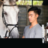 2000mg CBD Horse tincture inset over an Asian man feeding his horse at the stable