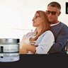CBD facial cream inset over a man and woman on a yacht cuddling