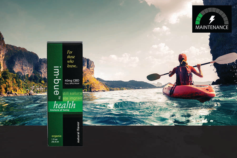 40mg CBD tincture inset over a woman in a kayak paddling near cliffs in the ocean