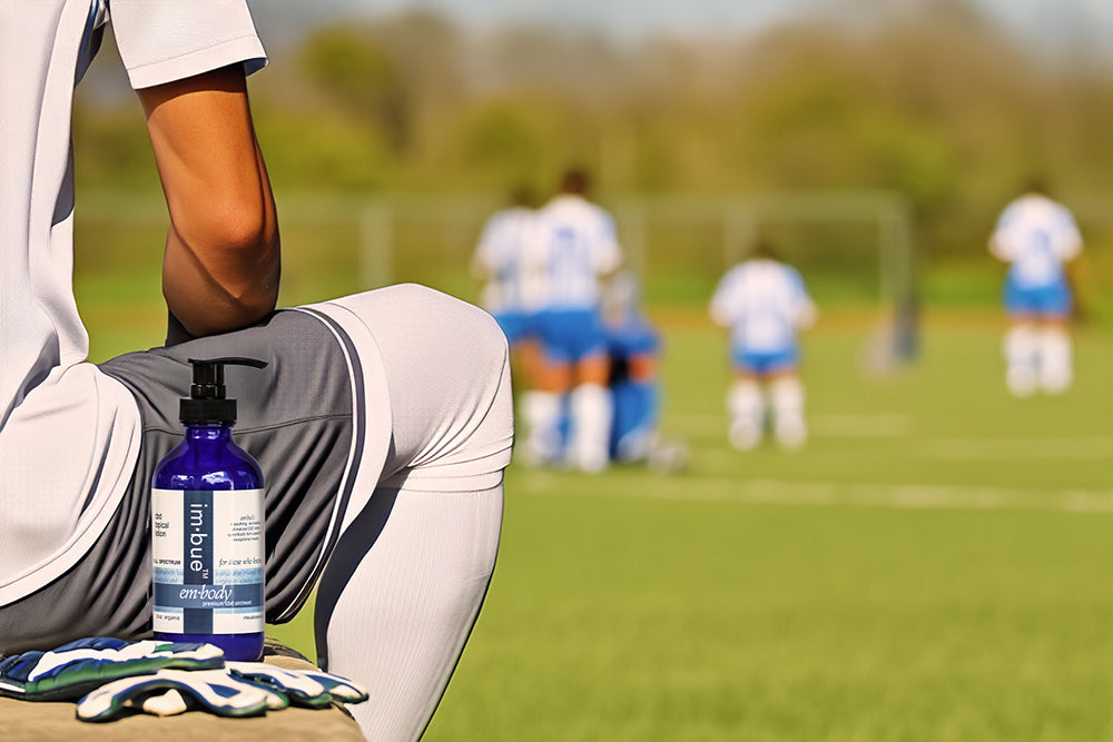 CBD Lotion Next to soccer player in field